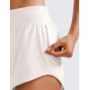 imageCRZ YOGA High Waisted Running Shorts for Women 25  Mesh Liner Quick Dry for Workout Sport Athletic with Zipper PocketMilky White Bone