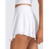 imageCRZ YOGA Lightweight Drapey Side Slit Tennis Skirts for Women  High Waisted Mini Flowy Lined Golf Skort with PocketsWhite