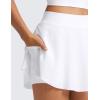 imageCRZ YOGA Lightweight Drapey Side Slit Tennis Skirts for Women  High Waisted Mini Flowy Lined Golf Skort with PocketsWhite