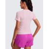 imageCRZ YOGA Seamless Workout Tops for Women Waist Length  Running Gym Athletic Yoga Short Sleeve Shirts Breathable CrewneckStrawberry Pink