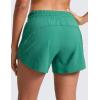 imageCRZ YOGA Dolphin Athletic Shorts for Women 5  High Waisted Quick Dry for Running Workout Gym Track with Zip PocketCascadia Green