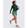 imageCRZ YOGA Dolphin Athletic Shorts for Women 5  High Waisted Quick Dry for Running Workout Gym Track with Zip PocketCascadia Green