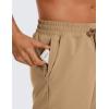 imageCRZ YOGA Mens Linerless Workout Shorts 5  Lightweight Quick Dry for Running Sports Athletic Gym with PocketsKhaki Sand