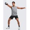 imageCRZ YOGA Mens Linerless Split Training Shorts 7  Lightweight Quick Dry Soft Workout Running Athletic Gym with PocketsBlack