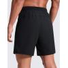 imageCRZ YOGA Mens Side Split Workout Shorts 7  Linerless Daily Quick Dry for Gym Athletic Casual with PocketsBlack