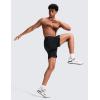 imageCRZ YOGA Mens Side Split Workout Shorts 7  Linerless Daily Quick Dry for Gym Athletic Casual with PocketsBlack