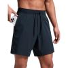imageCRZ YOGA Mens Side Split Workout Shorts 7  Linerless Daily Quick Dry for Gym Athletic Casual with PocketsTrue Navy