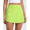 imageCRZ YOGA High Waisted Side Slit Tennis Skirts for Women  Mini Lined A Line Running Athletic Skort with Inner PocketsChartreuse