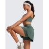 imageCRZ YOGA High Waisted Side Slit Tennis Skirts for Women  Mini Lined A Line Running Athletic Skort with Inner PocketsDark Forest Green