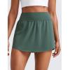 imageCRZ YOGA High Waisted Side Slit Tennis Skirts for Women  Mini Lined A Line Running Athletic Skort with Inner PocketsDark Forest Green