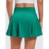 imageCRZ YOGA Softretch Flowy Pleated Tennis Skirts for Women  High Rise Mini Golf Casual Skort with Inner Shorts Side PocketsCascadia Green
