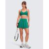imageCRZ YOGA Softretch Flowy Pleated Tennis Skirts for Women  High Rise Mini Golf Casual Skort with Inner Shorts Side PocketsCascadia Green