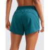 imageCRZ YOGA Dolphin Athletic Shorts for Women 5  Mid Waisted Quick Dry for Running Workout Gym Track with Zip PocketBorealis Green