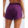 imageCRZ YOGA Dolphin Athletic Shorts for Women 5  Mid Waisted Quick Dry for Running Workout Gym Track with Zip PocketPlum Magenta