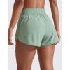 imageCRZ YOGA Dolphin Flat Waist Athletic Shorts for Women 3  High Rise Quick Dry for Running Workout Gym Track with Zip PocketsGreen Palm Court