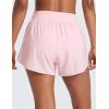 imageCRZ YOGA Dolphin Flat Waist Athletic Shorts for Women 3  High Rise Quick Dry for Running Workout Gym Track with Zip PocketsStrawberry Pink