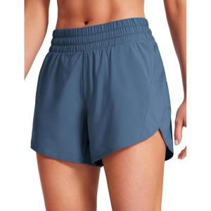 imageCRZ YOGA Dolphin Athletic Shorts for Women 5  Mid Waisted Quick Dry for Running Workout Gym Track with Zip PocketStelindigo Blue