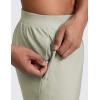 imageCRZ YOGA Mens Linerless Split Training Shorts 7  Lightweight Quick Dry Soft Workout Running Athletic Gym with PocketsFog Green